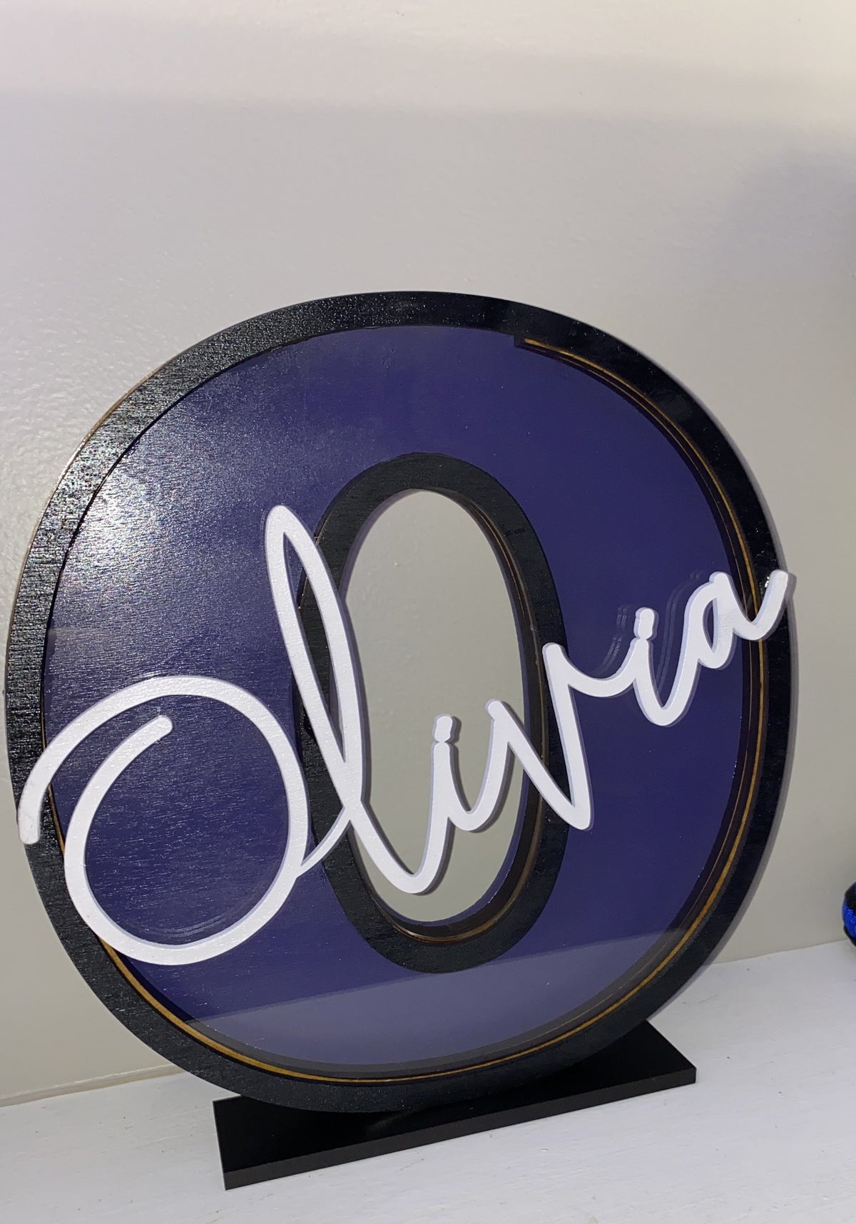 Purple letter O name piggy bank with the name Olivia